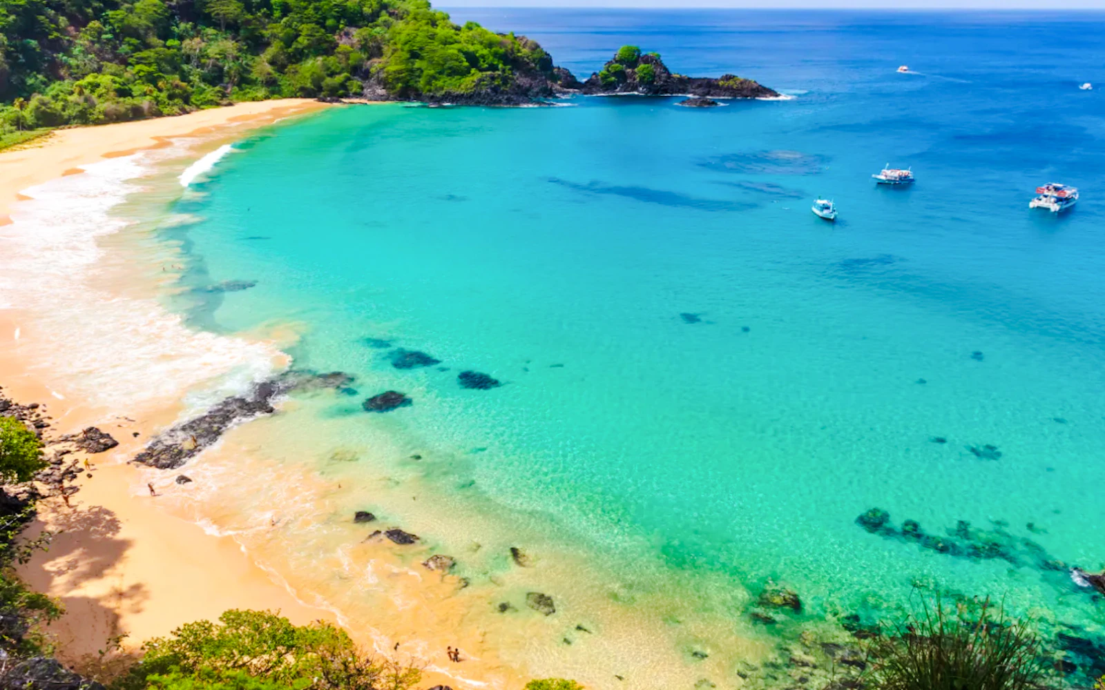 Fernando de Noronha Coast-to-Coast Boat Tour via Dolphin Bay with Sancho Beach Snorkeling Stop (Product 55770)