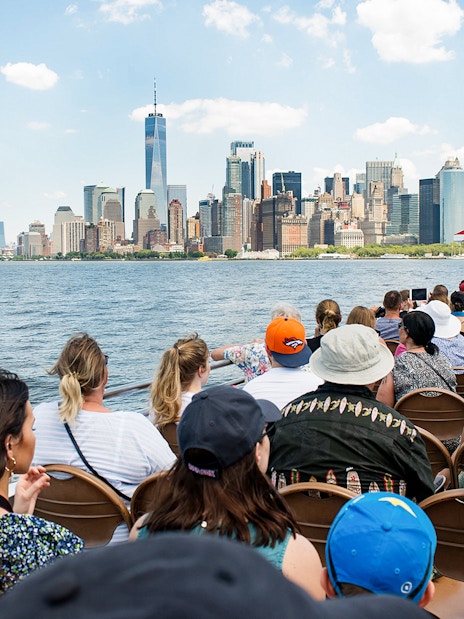 Guests on Liberty Super Express viewing New York City skyline.