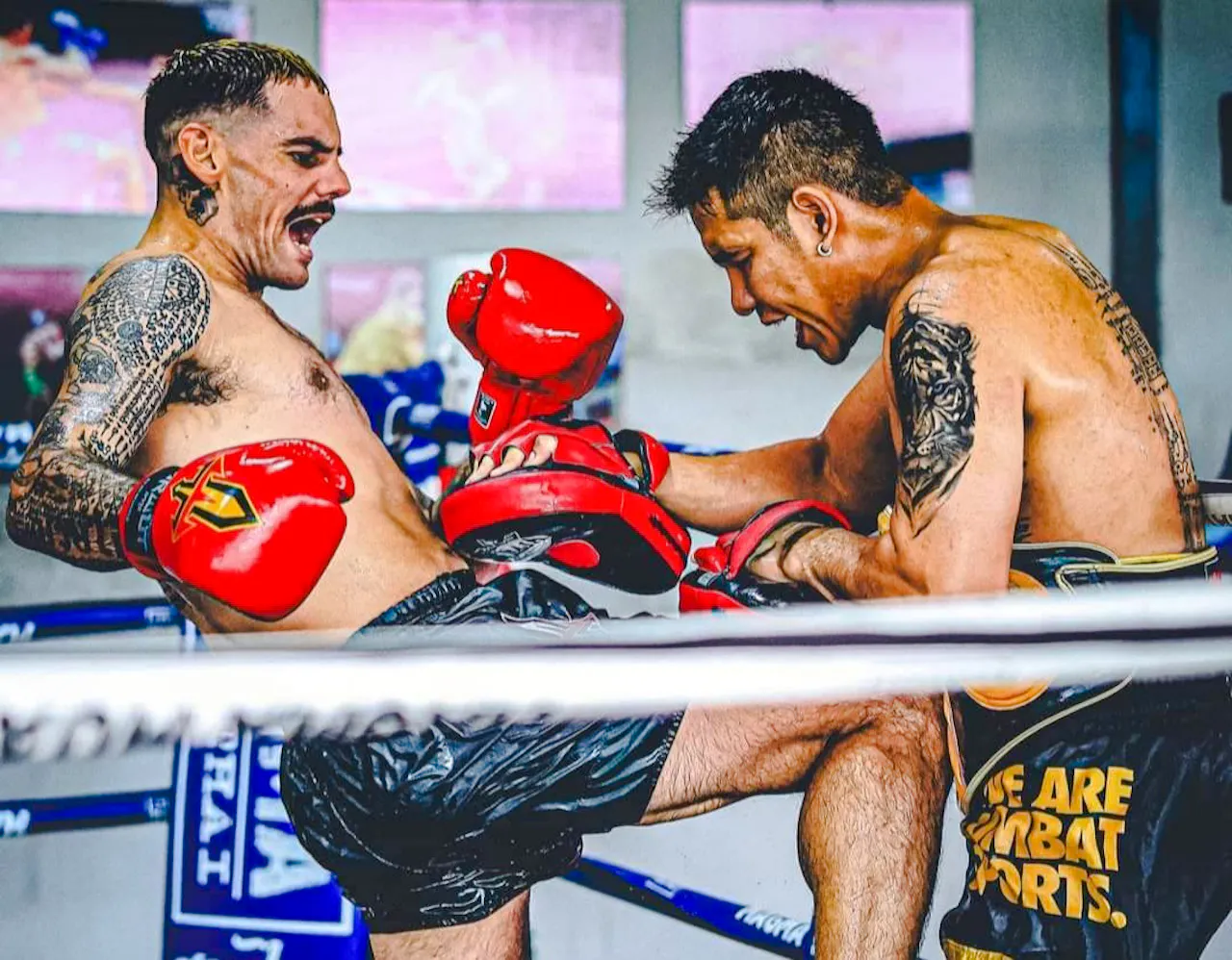Muay Thai fighters practicing in a Pattaya boxing class for beginners.