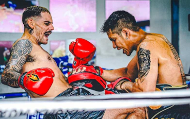 Muay Thai fighters practicing in a Pattaya boxing class for beginners.