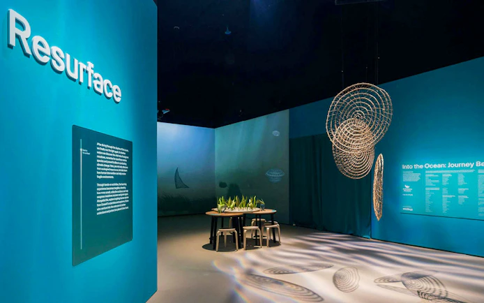 Into the Ocean: Journey Beneath" exhibition at ArtScience Museum, Singapore, featuring ocean-themed displays.