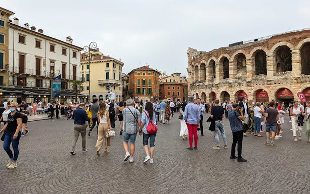 Crowd in Piazza Bra near Verona Arena during guided tour from Lake Garda.