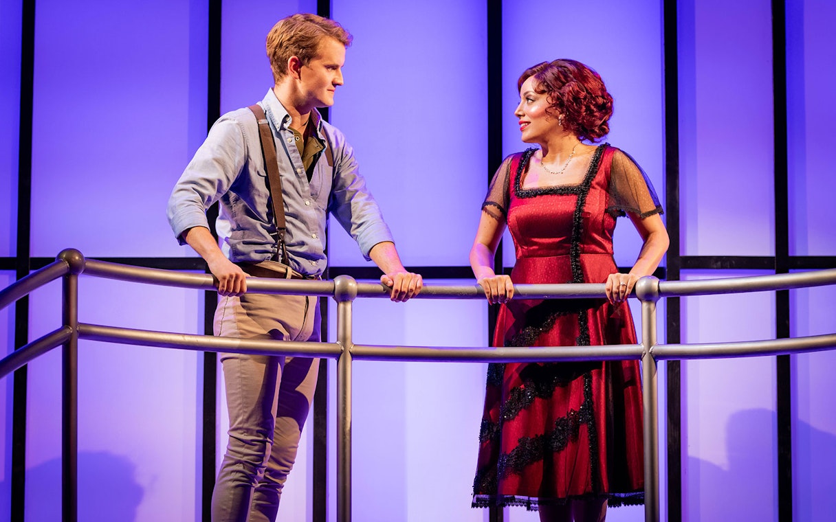 Actors performing on stage in Titanique West End show.