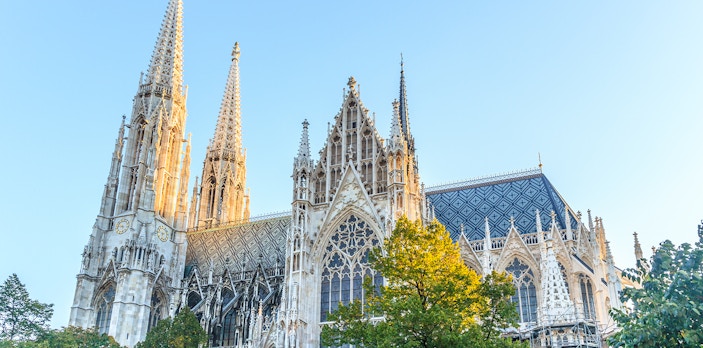 Votive Church in Vienna with twin spires and intricate Gothic architecture.