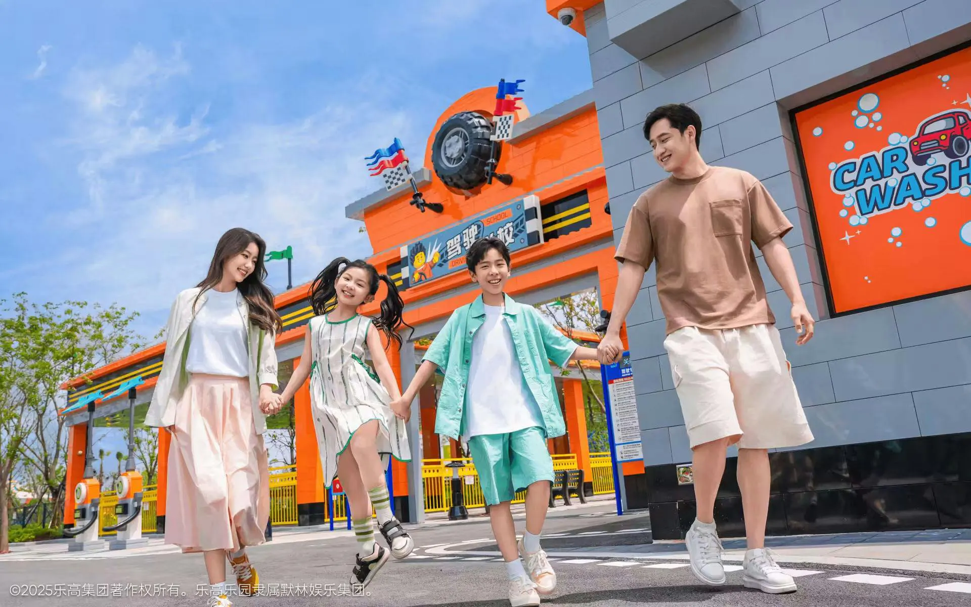 Family walking past the Car Wash attraction at Legoland Shanghai.