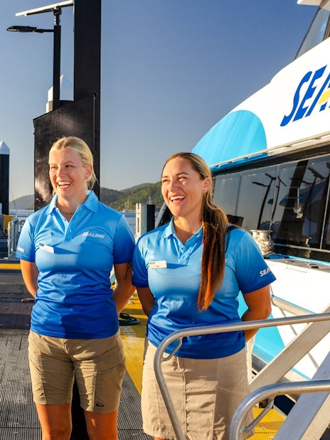 Tourists and crew at Airlie Beach preparing for Hill Inlet Lookout and Whitehaven Beach cruise.