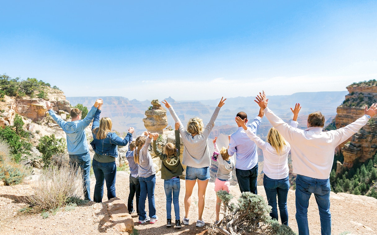 Group enjoying view at Grand Canyon National Park during Hummer tour.