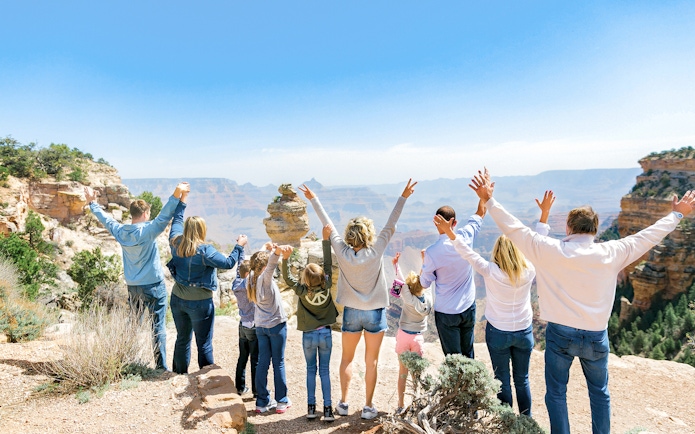 Group enjoying view at Grand Canyon National Park during Hummer tour.