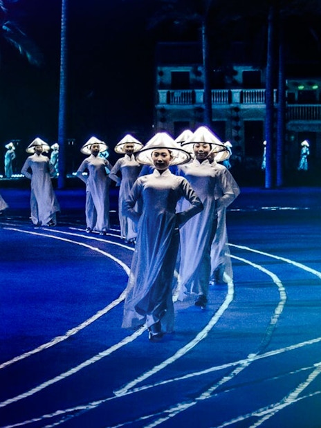 Performers in traditional attire at Hoi An Memories Show, Vietnam.