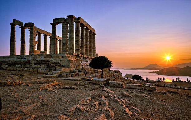 Temple of Poseidon at Cape Sounion with sunset view, Athens.