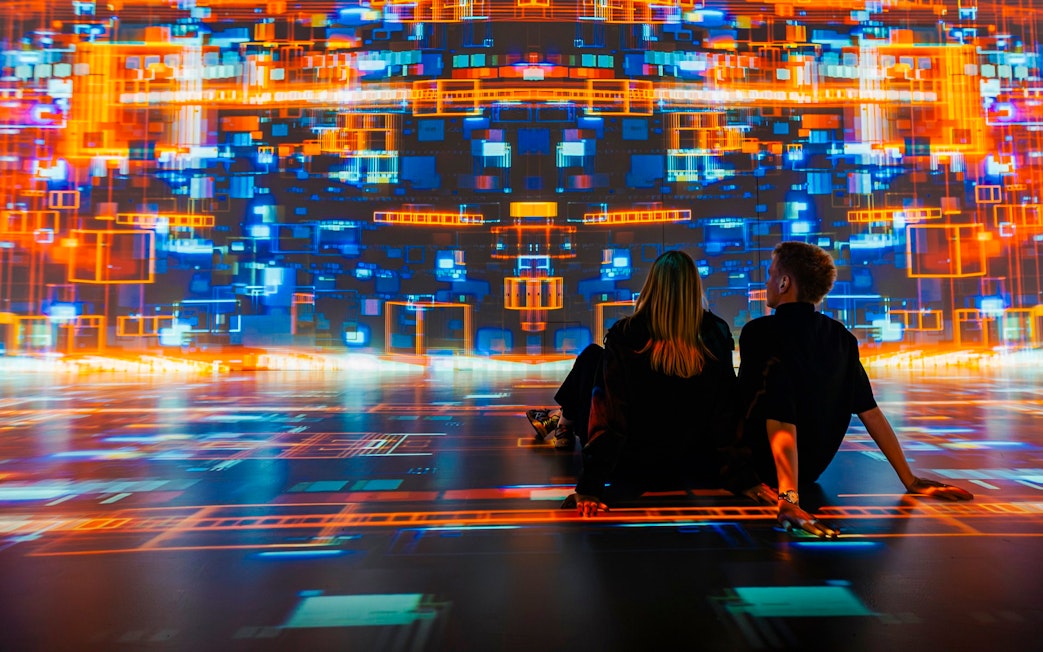 Guests viewing digital art projections at Signal Space Digital Art Gallery.