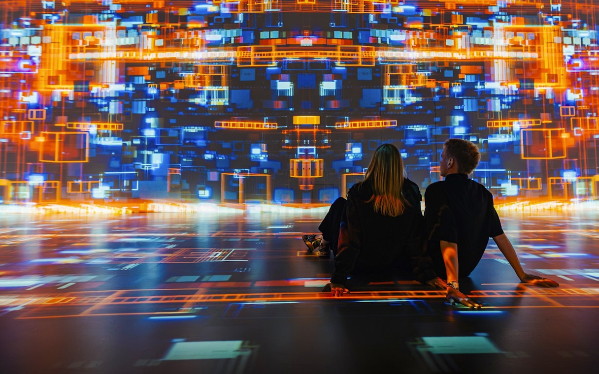 Guests viewing digital art projections at Signal Space Digital Art Gallery.