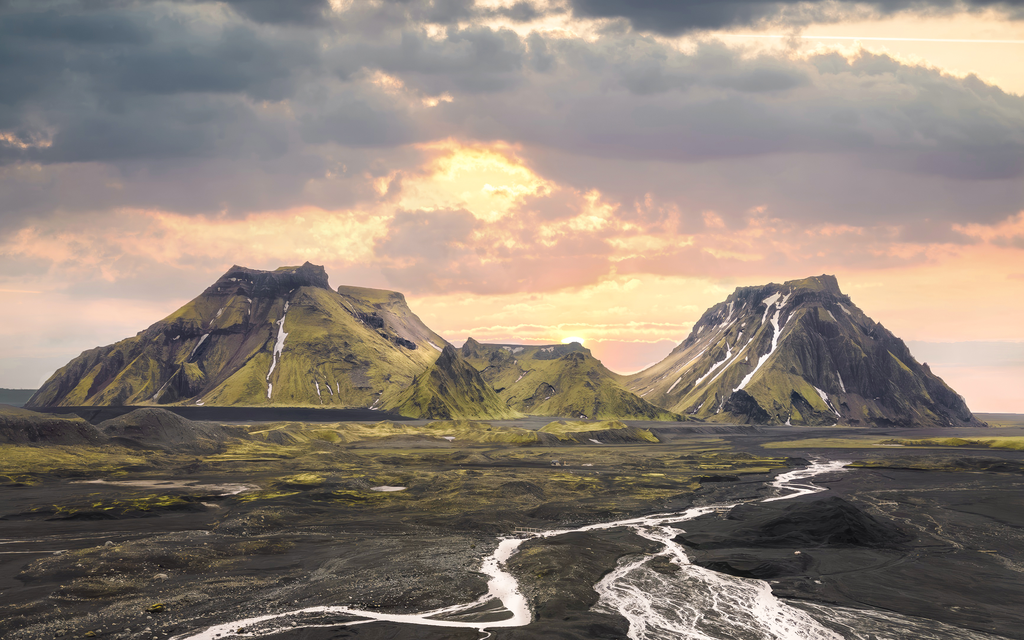 Katla volcano landscape with rugged mountains and river in Iceland.