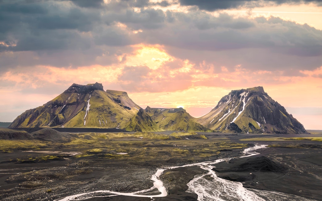 Katla volcano landscape with rugged mountains and river in Iceland.