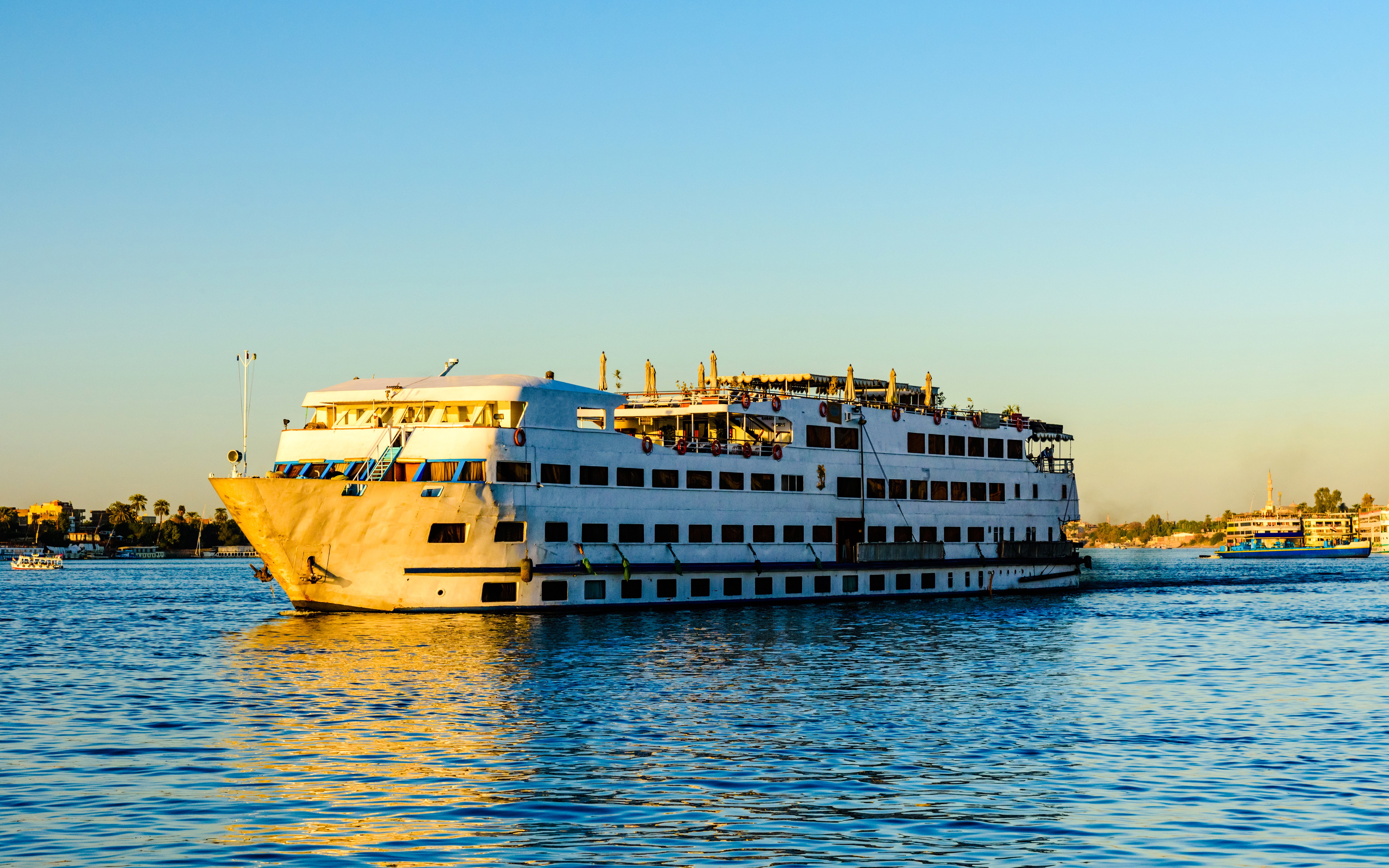Cruise ship sailing on the Nile River in Luxor, Egypt.