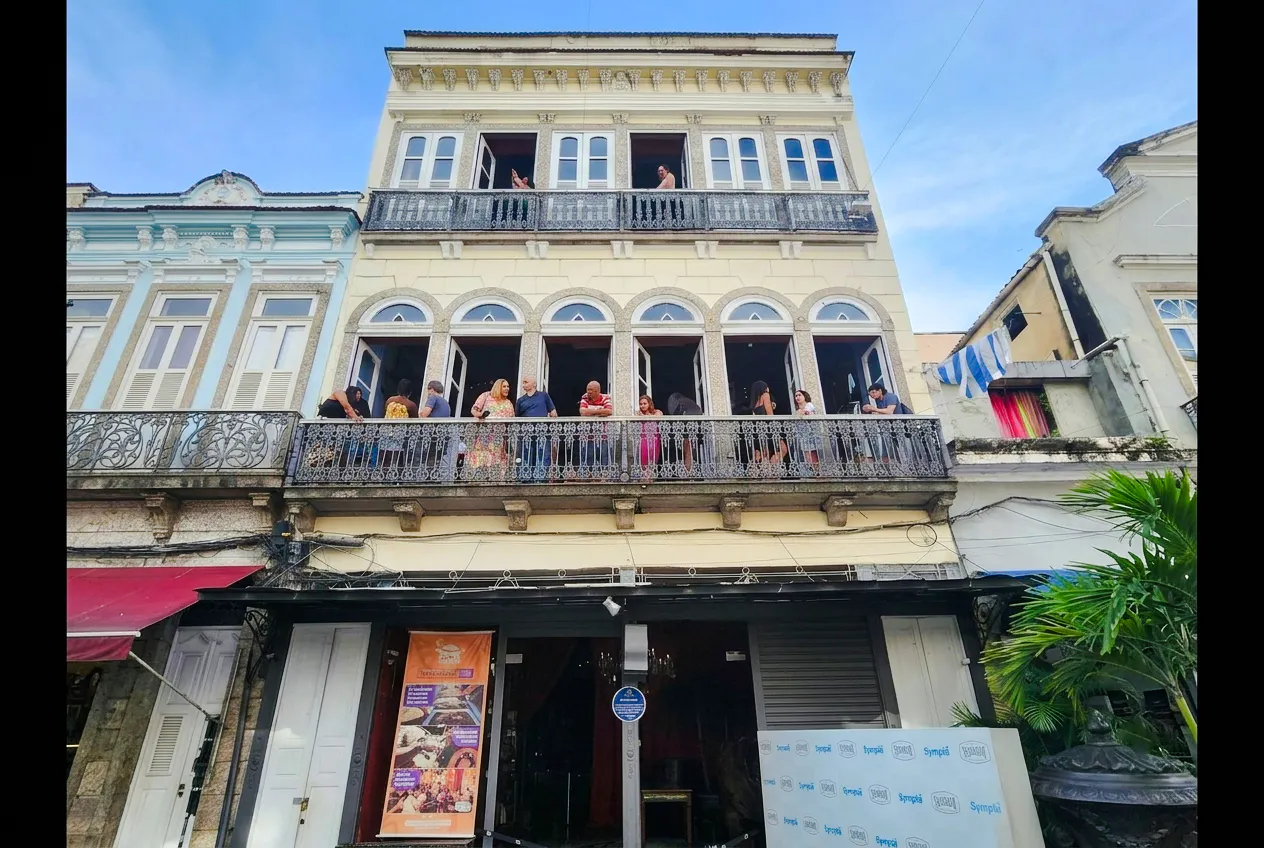 Facade of Rio Scenarium with people on the balcony, Rio de Janeiro.
