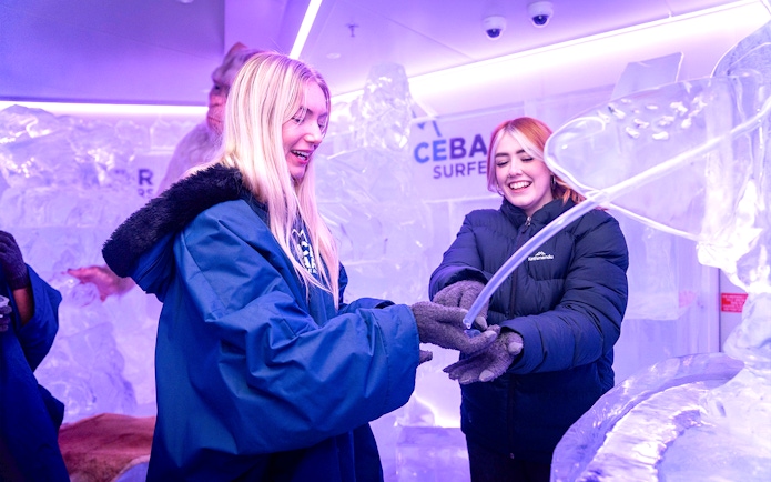 Guests enjoying ice sculptures at IceBar Surfers Paradise.