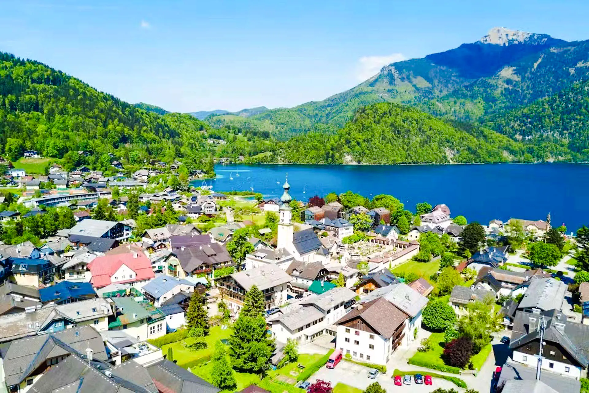 Aerial view of Hallstatt village with lake and mountains, Salzburg tour.