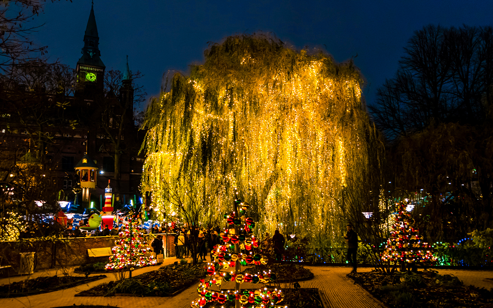 Tivoli Gardens in Copenhagen illuminated with Christmas lights and decorations.