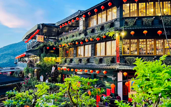 A-Mei Tea House adorned with red lanterns in Jiufen Old Street, New Taipei City, Taiwan.