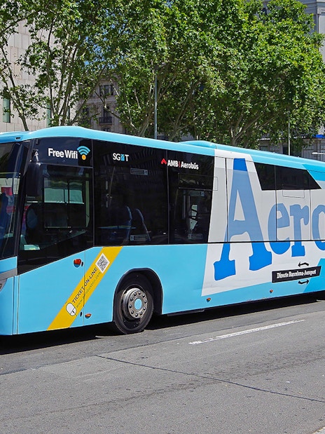 Aerobus at Barcelona street, offering airport transfer service.