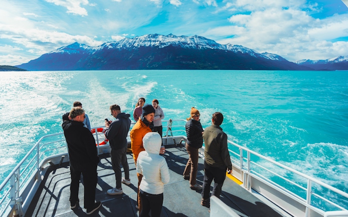 Tourists on a boat tour at Lago Argentino, Los Glaciares National Park, Patagonia, Argentina.