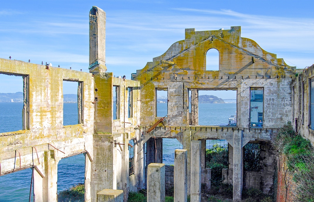 Alcatraz Island Officers' Club historic building exterior with weathered facade and barred windows.