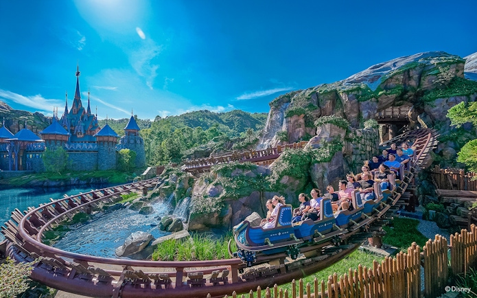 Roller coaster near Frozen Ever After castle at Disneyland Hong Kong.