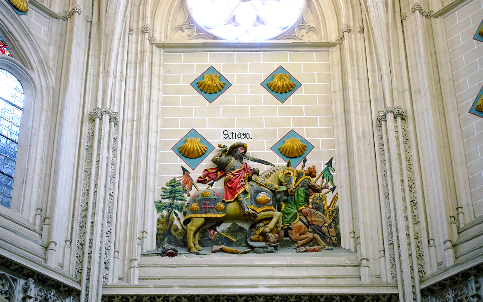 Chapel of Saint James interior with ornate ceiling and arches, Toledo Cathedral, Spain.