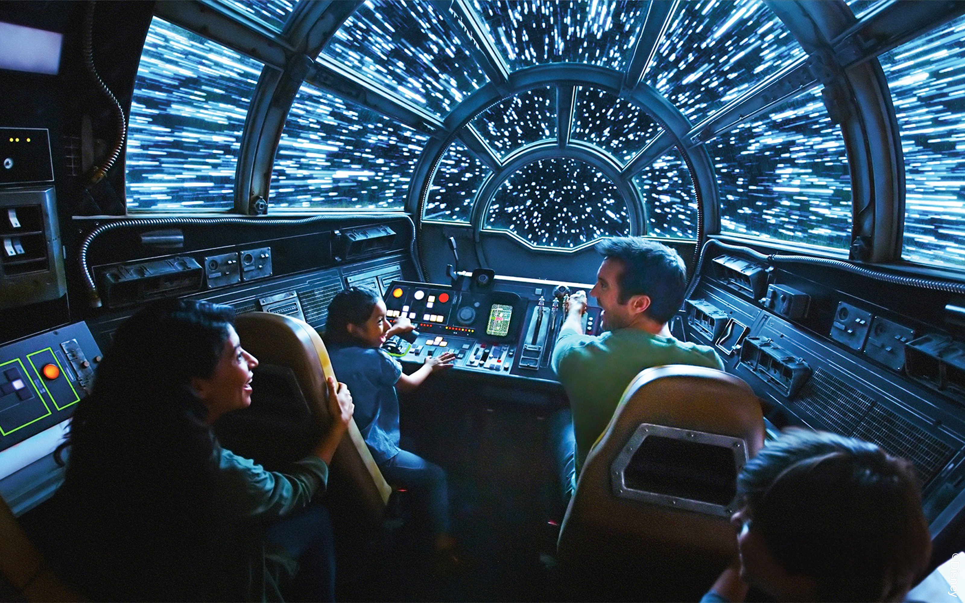 Guests enjoying Star Wars Galaxy's Edge spaceship ride at Disneyland Adventure Park, California.