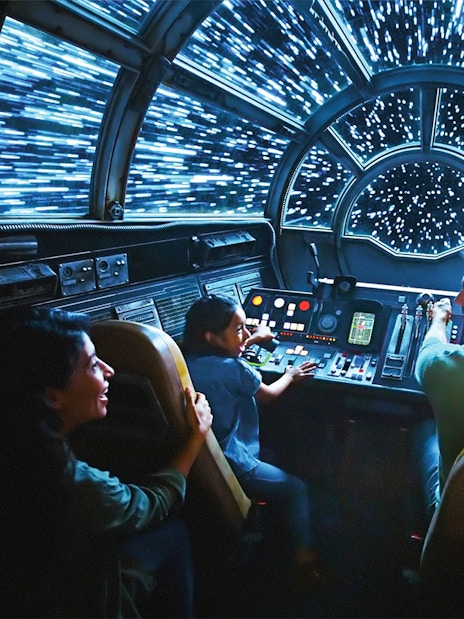 Guests enjoying Star Wars Galaxy's Edge spaceship ride at Disneyland Adventure Park, California.