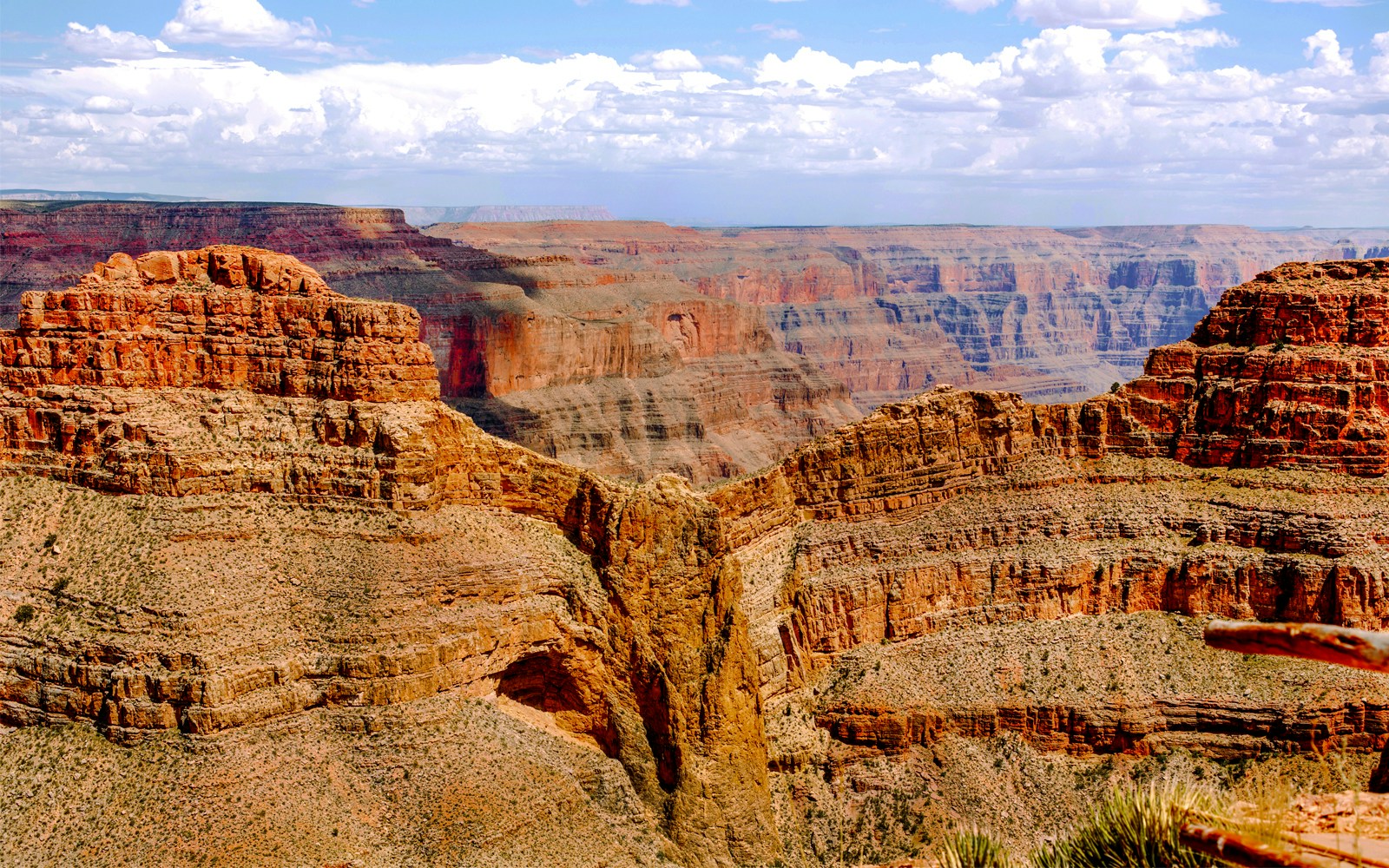 Helicopter flying over Grand Canyon West with view of Eagle Point, USA.