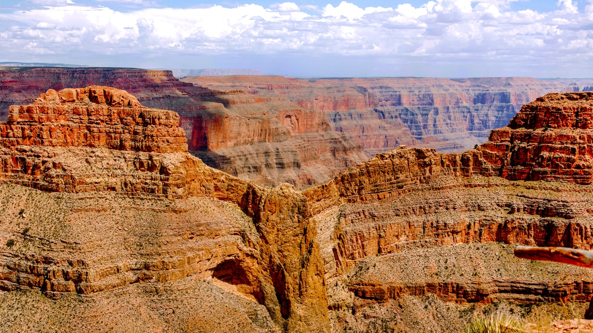 Helicopter flying over Grand Canyon West with view of Eagle Point, USA.