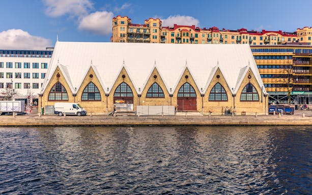 Feskekörka fish market building by the water in Gothenburg, Sweden.