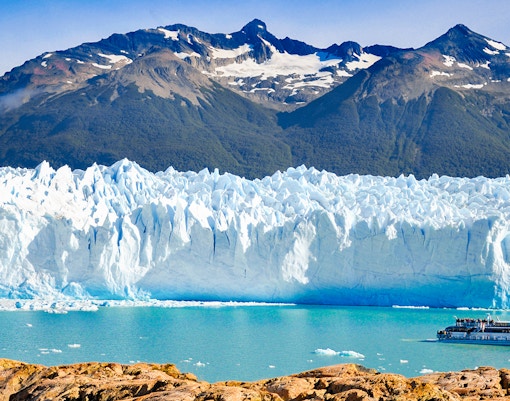 Glaciar Perito Moreno with boat tour on turquoise water, Patagonia, Argentina.