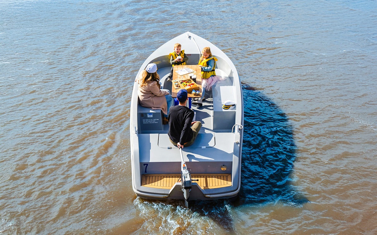 Group enjoying a self-drive picnic cruise on Yarra River.
