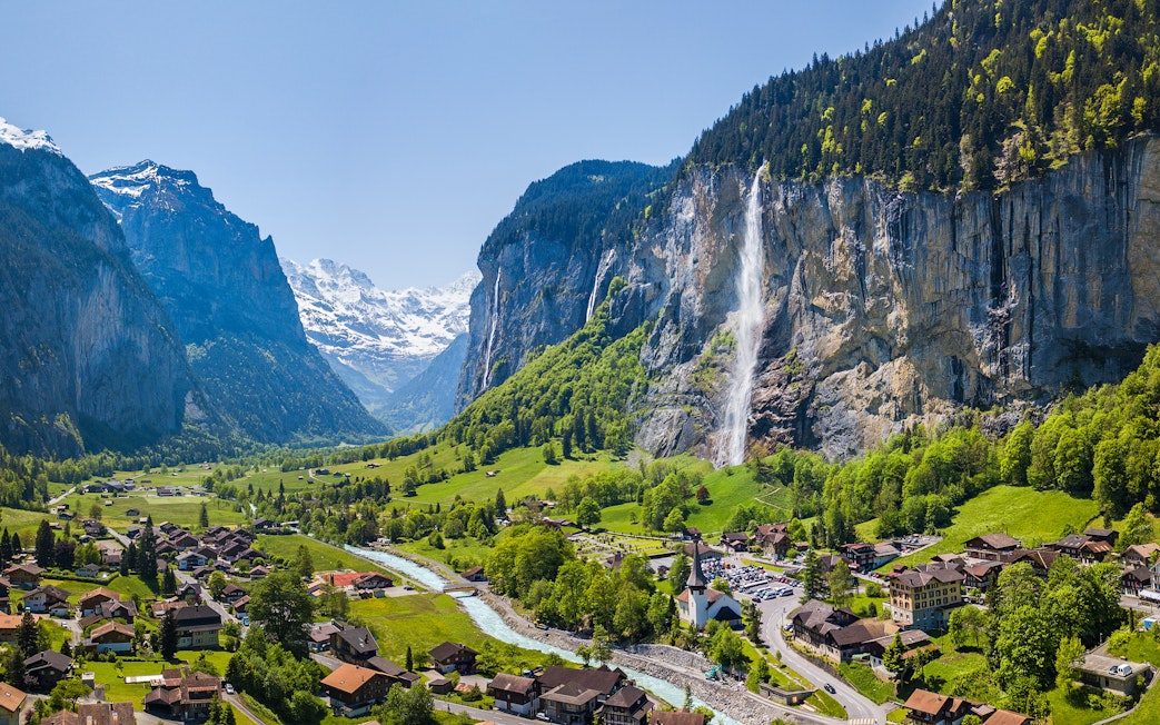 Lauterbrunnen village with Staubbach waterfall and Jungfrau mountain in the background.