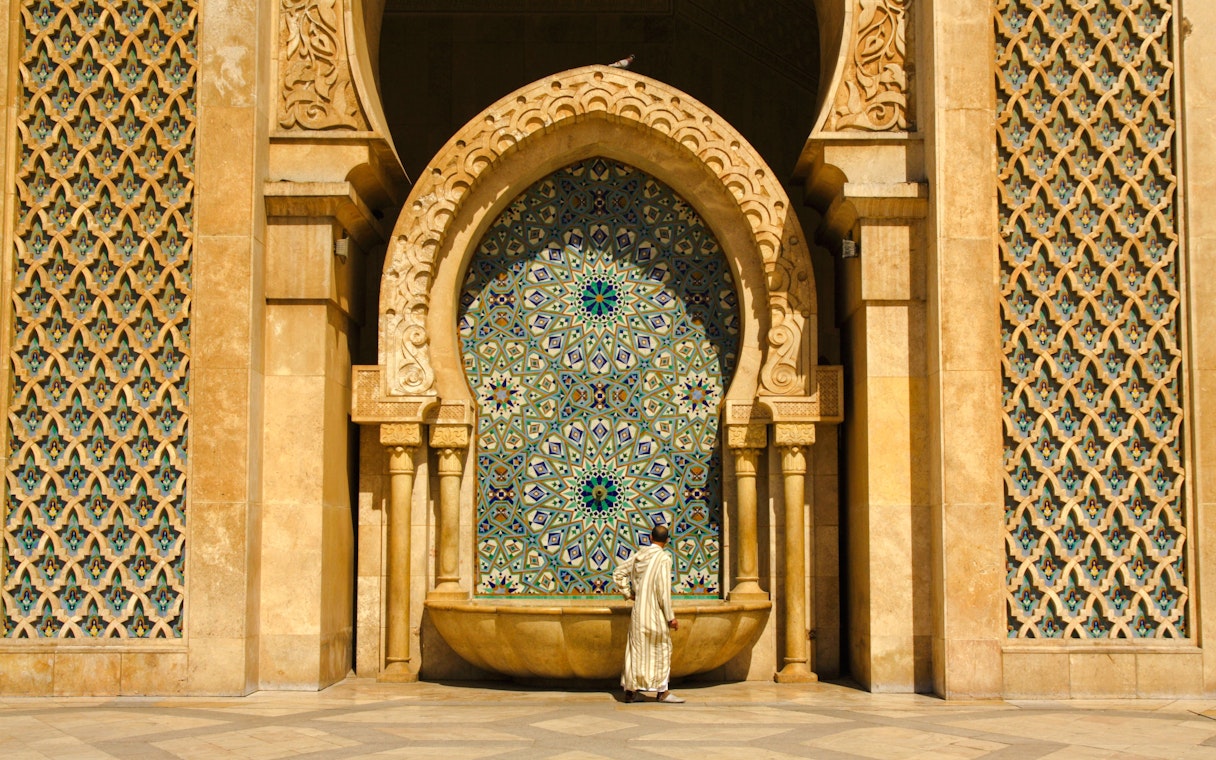 Ornate brass door and mosaic at Hassan II Mosque, Casablanca, Morocco.