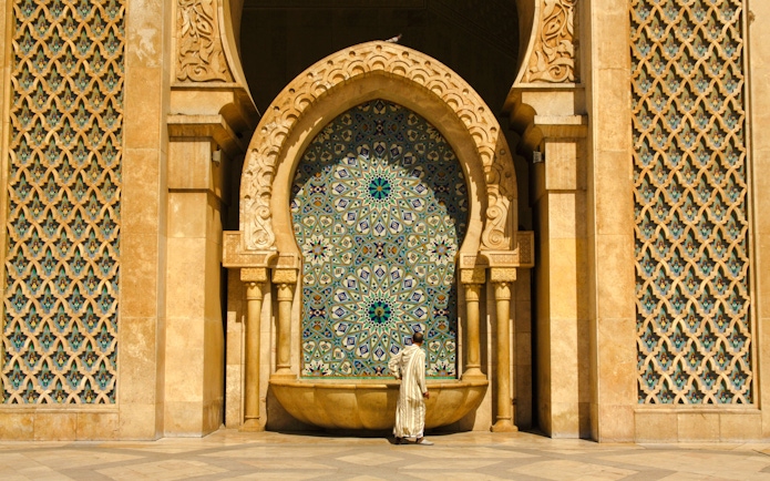 Ornate brass door and mosaic at Hassan II Mosque, Casablanca, Morocco.