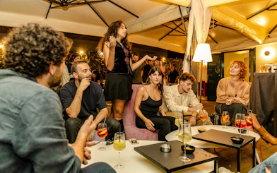Guests enjoying drinks and conversation at the Tipsy Tour in Rome.