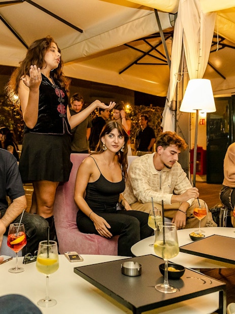 Guests enjoying drinks and conversation at the Tipsy Tour in Rome.