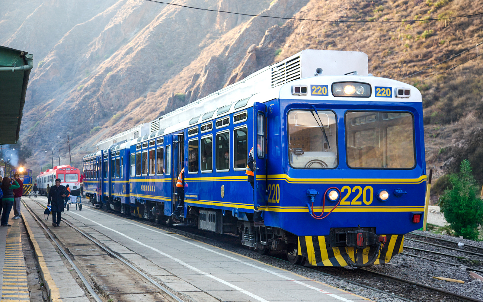 Blue train at station en route from Cusco to Machu Picchu, Peru.