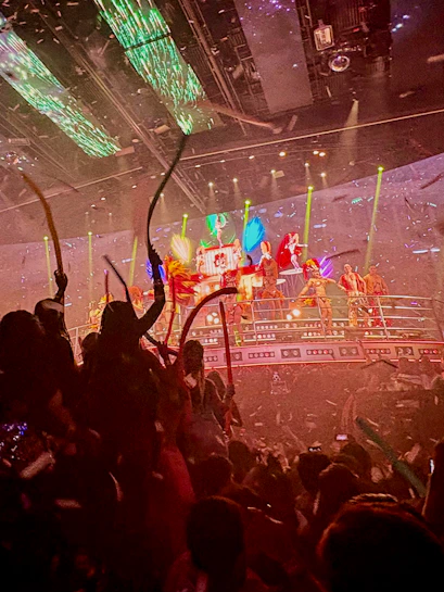 Coco Bongo Cancun nightclub with vibrant stage performance and lively crowd.