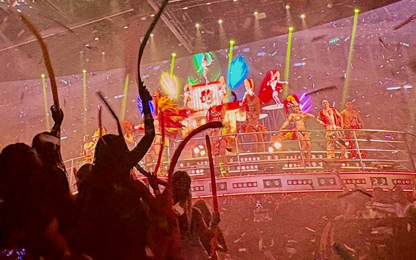 Coco Bongo Cancun nightclub with vibrant stage performance and lively crowd.