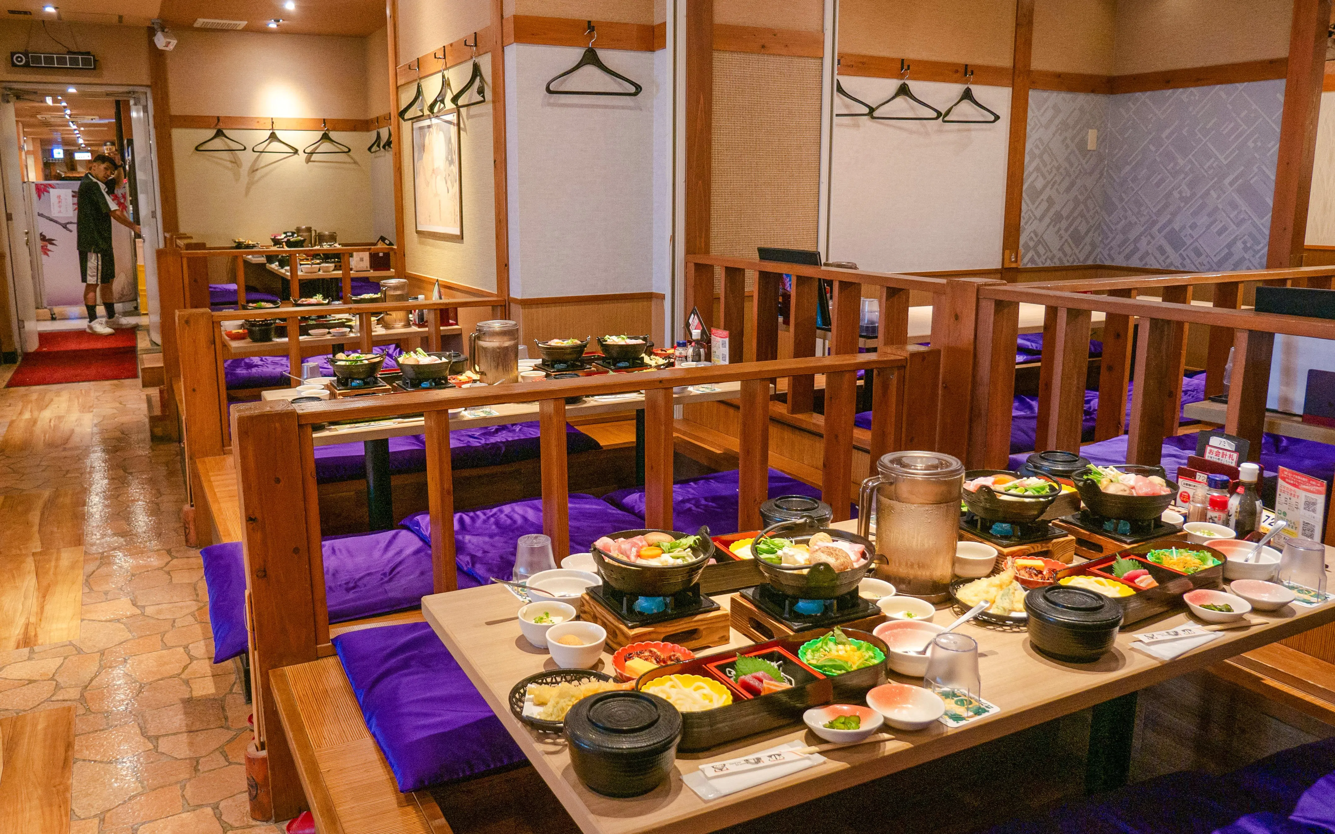 Tables set with traditional Japanese meals at Tokyo Family Sumo Workshop.