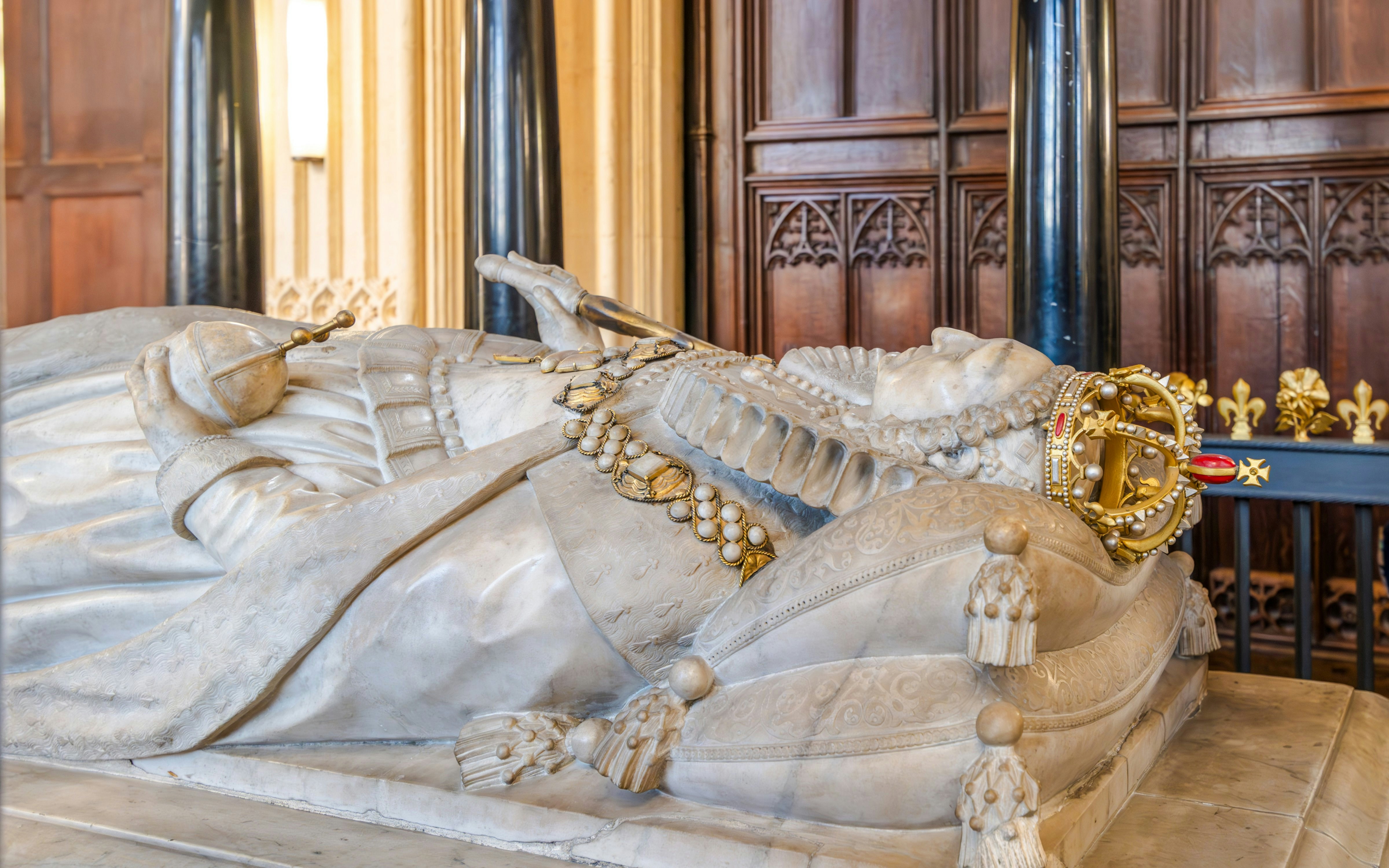Tomb of Elizabeth I in Westminster Abbey, featuring detailed stone effigy and crown.