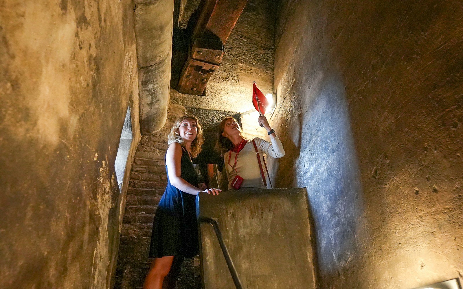 Guide explaining history of Florence's Duomo Cathedral to small group inside the cathedral.