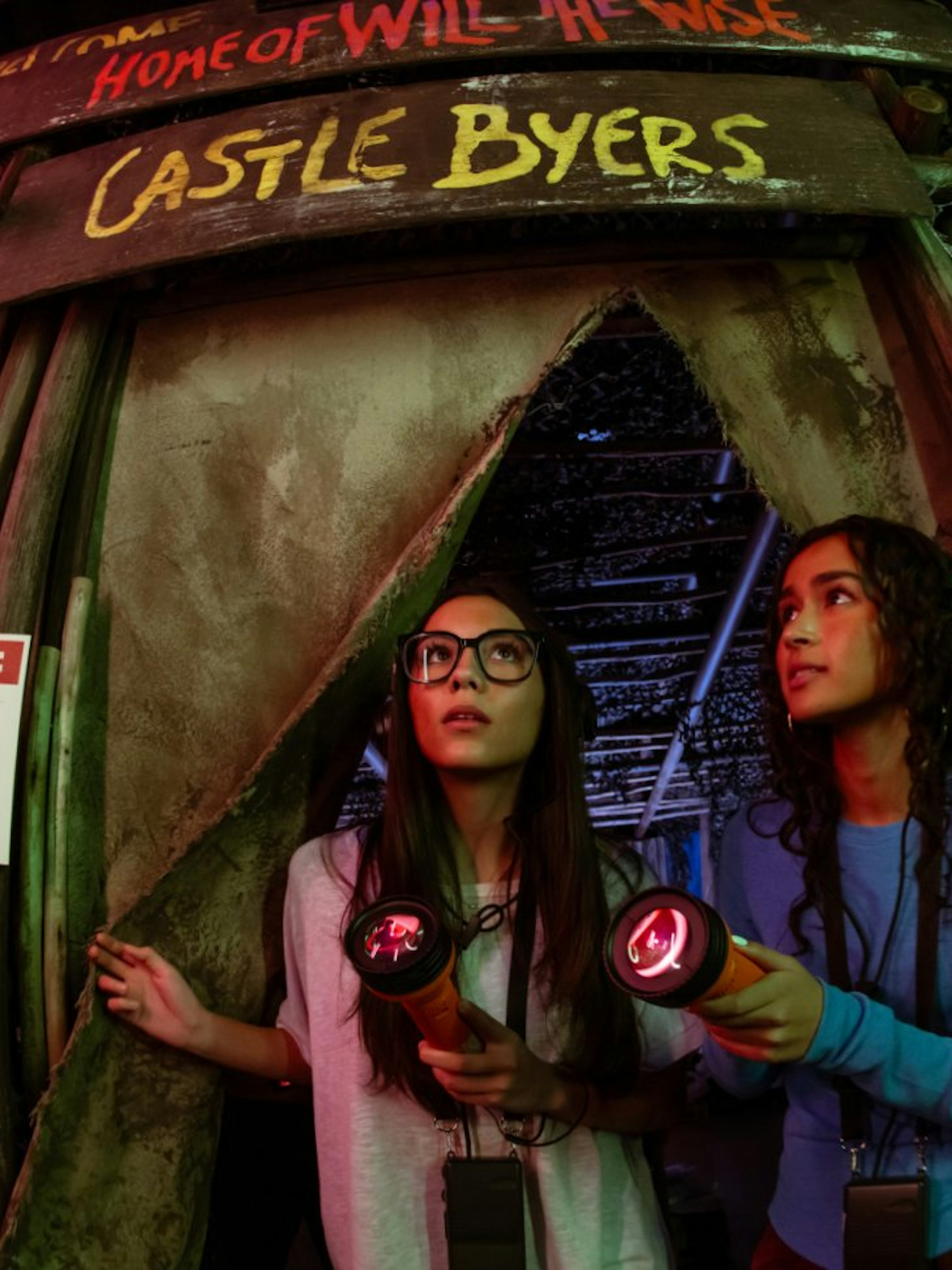 Visitors exploring Castle Byers set at Stranger Things play, Netflix house, Dallas.