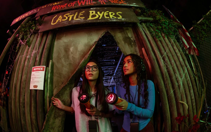 Visitors exploring Castle Byers set at Stranger Things play, Netflix house, Dallas.