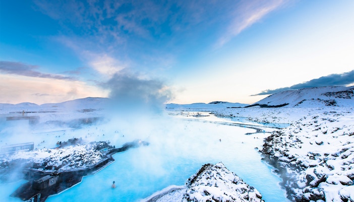 Blue Lagoon hot spring spa with visitors enjoying geothermal waters in Iceland.